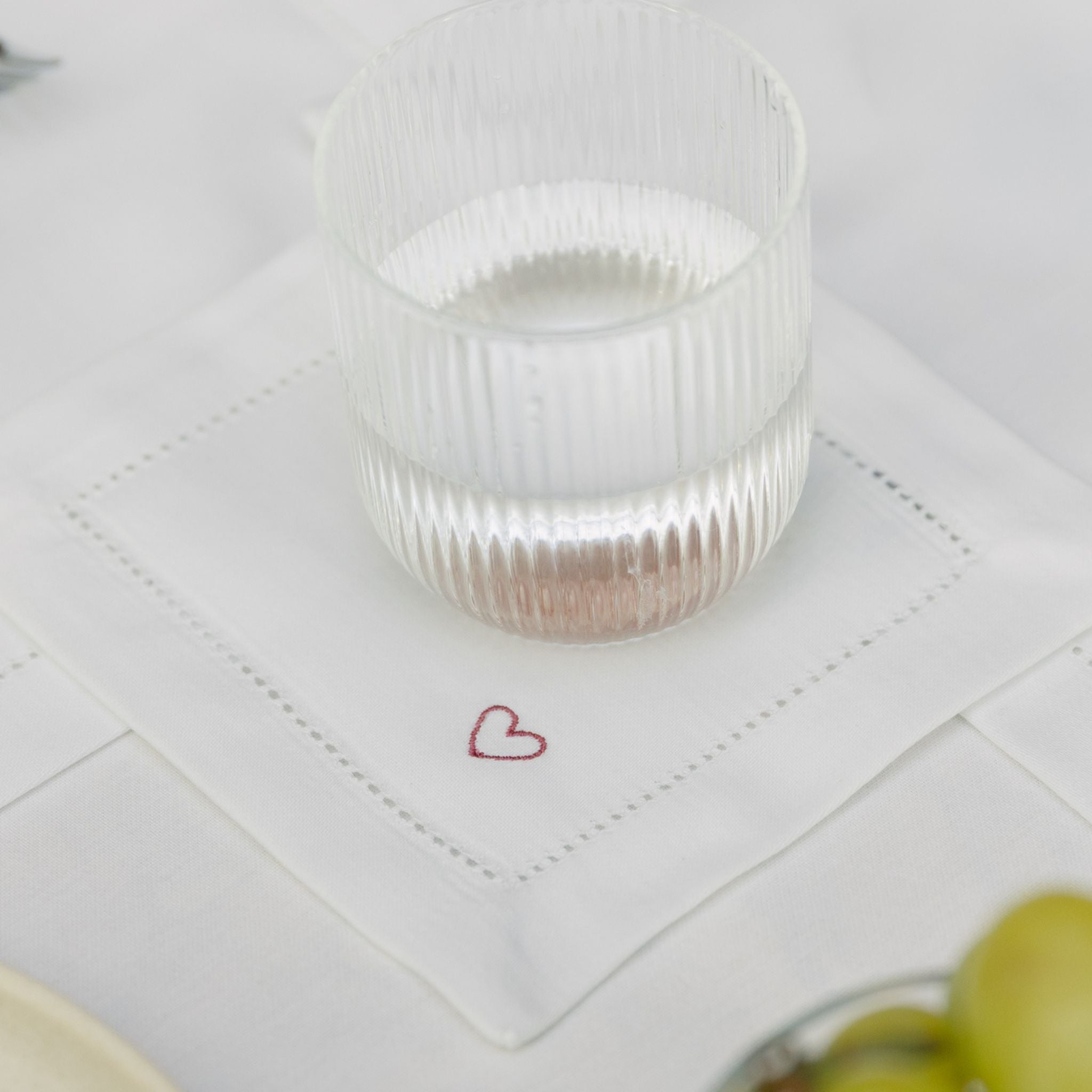 torres-novas-table-mafra-cotton-embroidery-heart-cocktail-napkin-old-pink-lifestyle-2.jpg