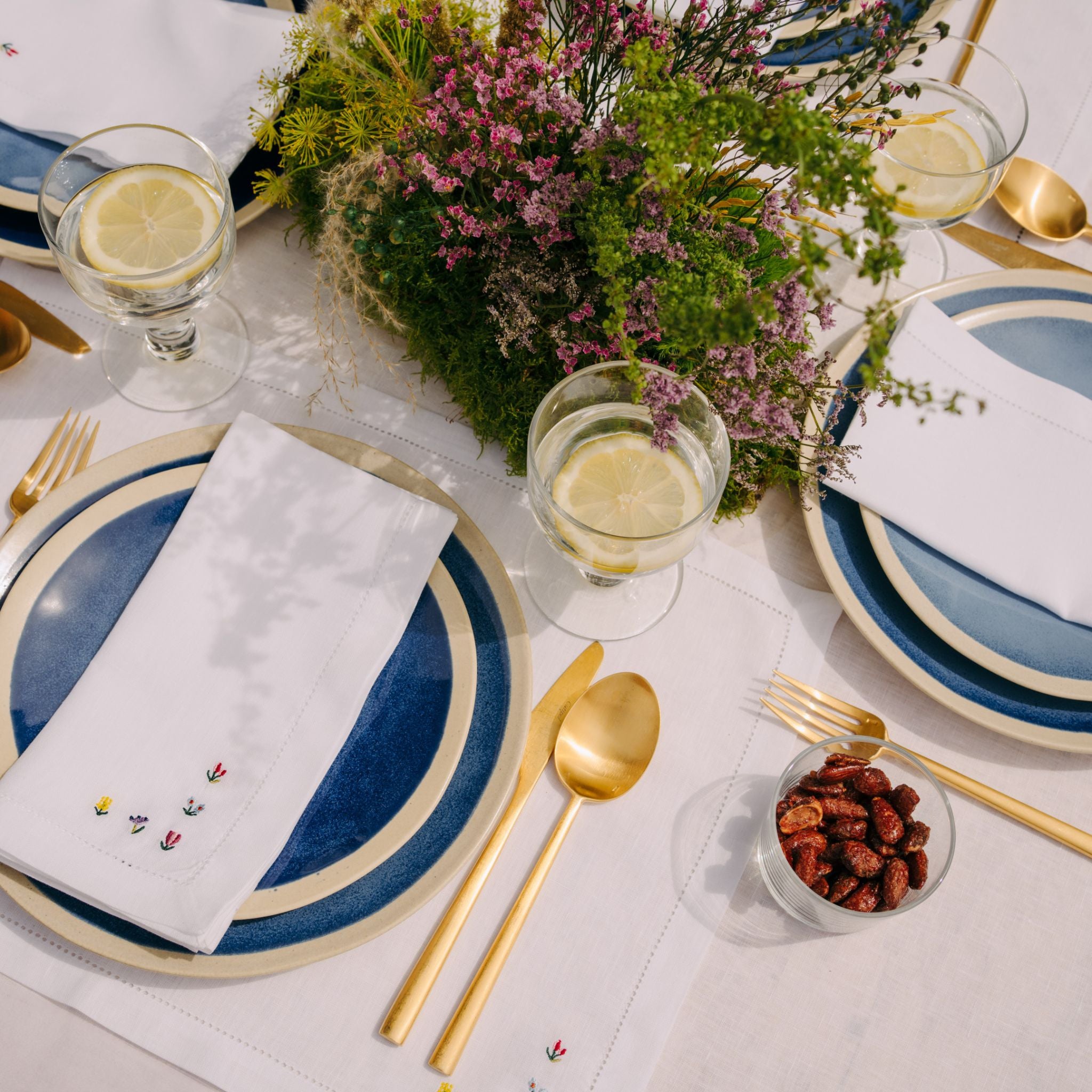 Mafra linen napkin and placemat with flower embroidery