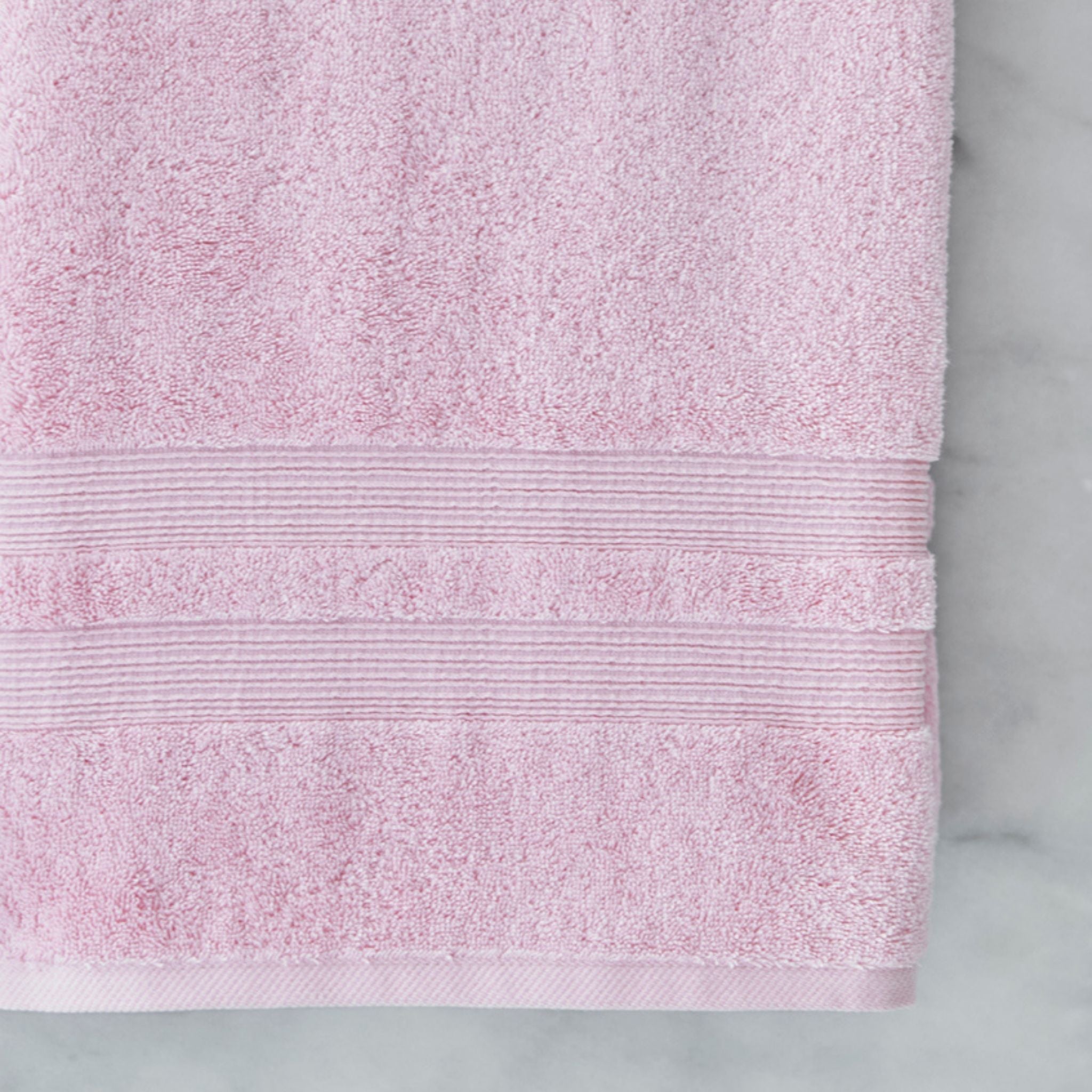 torres-novas-bath-elegance-plain-bath-towel-baby-pink-lifestyle-2.jpg