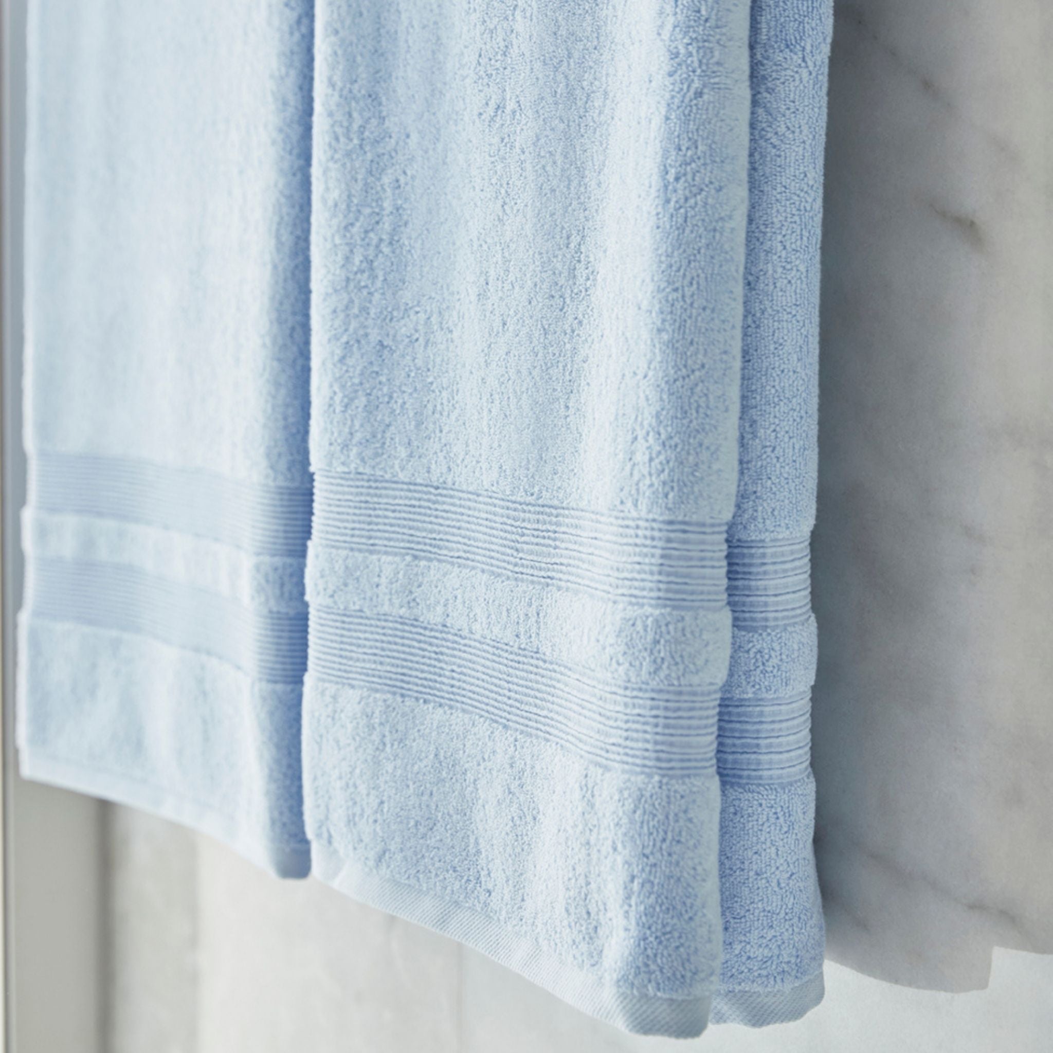 torres-novas-bath-elegance-plain-bath-towel-light-blue-lifestyle-2.jpg