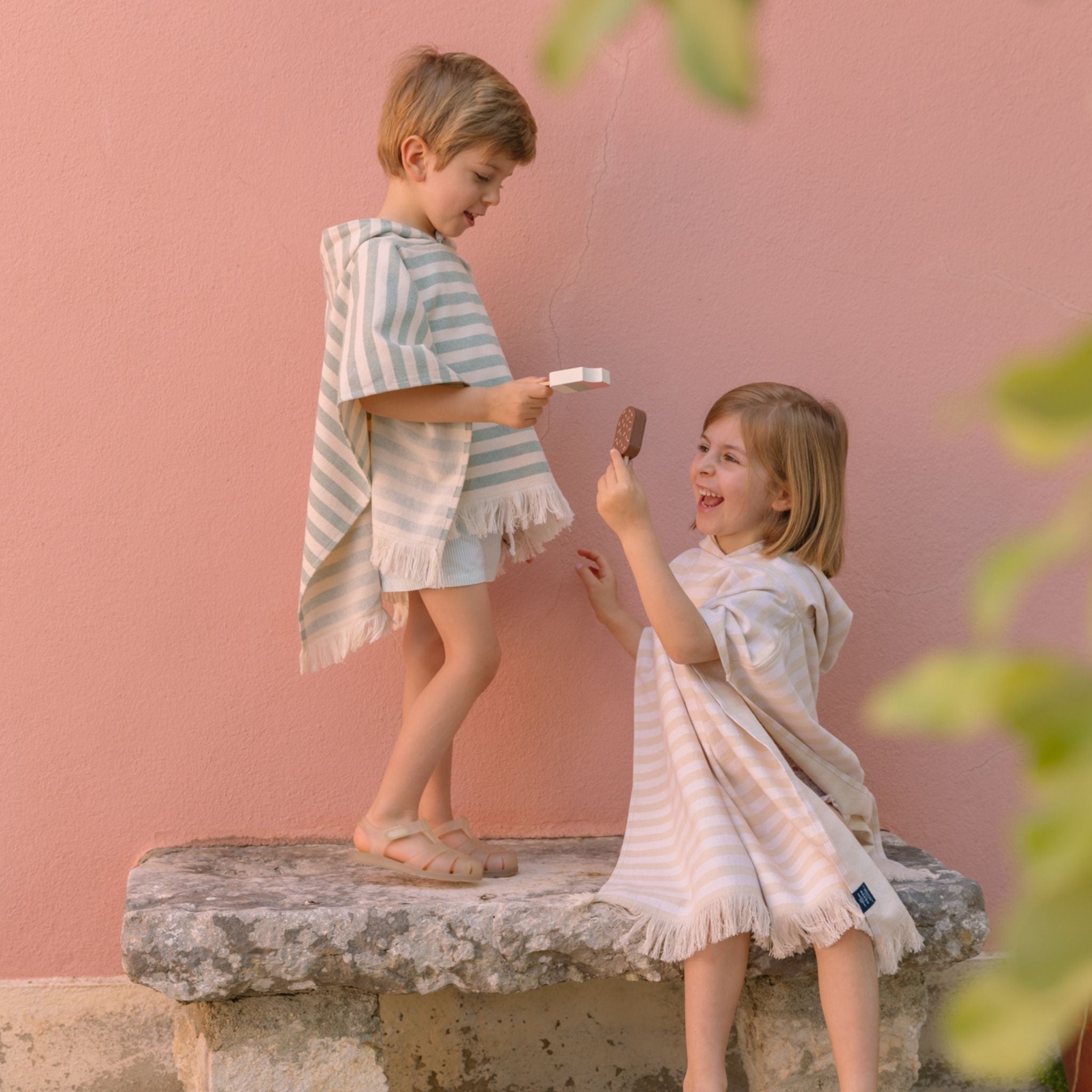 torres-novas-beach-barra-horizontal-stripes-kid-poncho-white-lifestyle-3.jpg