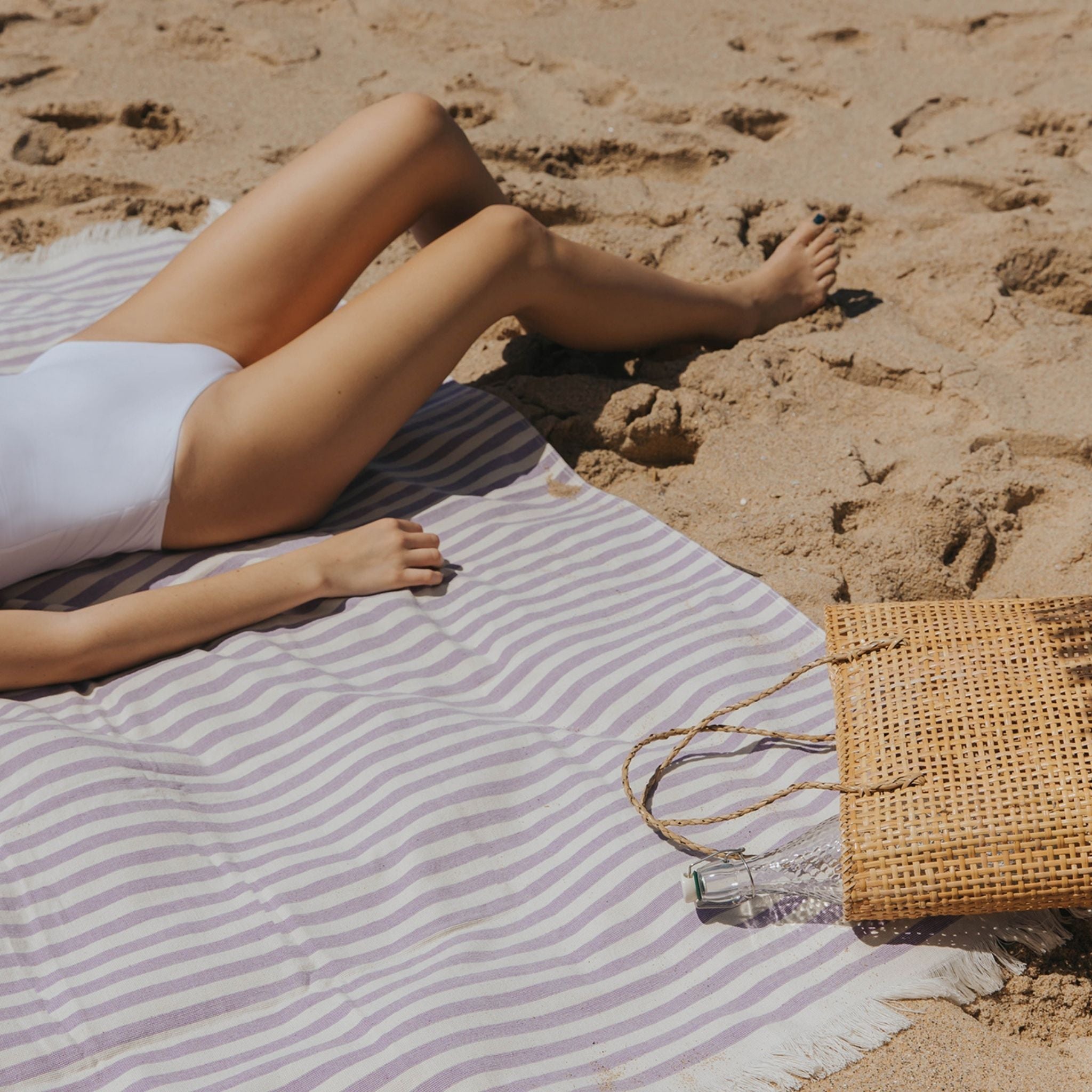 torres-novas-beach-barra-horizontal-stripes-towel-lavender-lifestyle-2.jpg