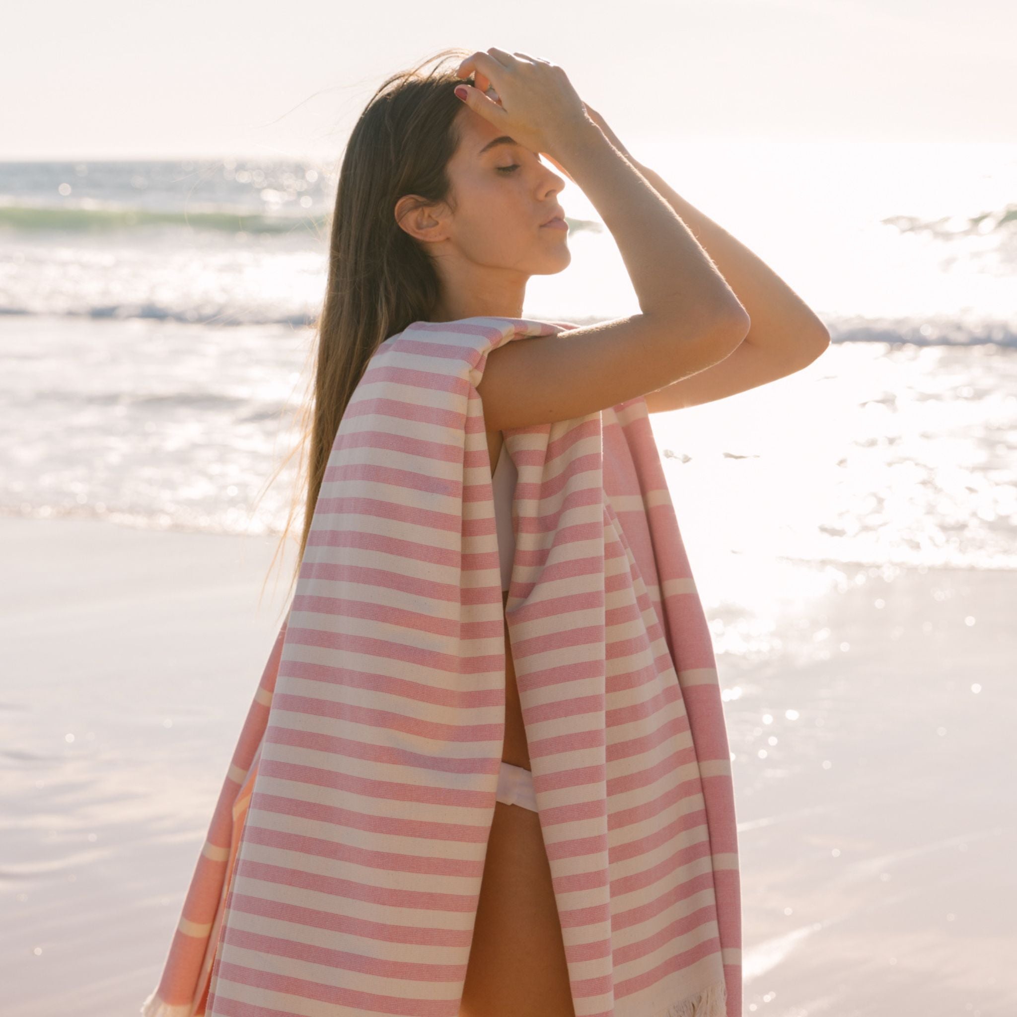 torres-novas-beach-barra-horizontal-stripes-towel-pink-lifestyle-4.jpg