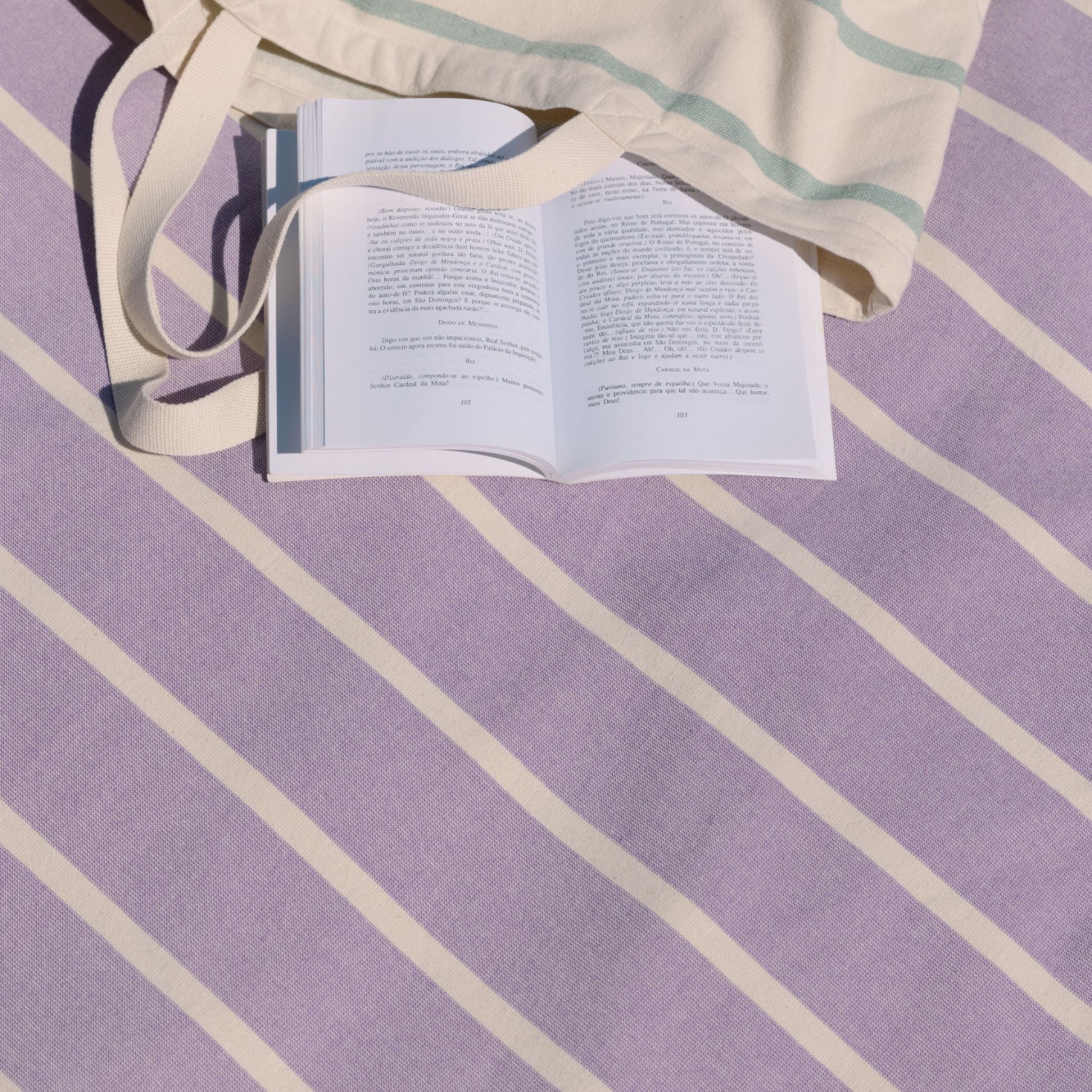 torres-novas-beach-belem-horizontal-stripes-towel-lavender-lifestyle-1.jpg