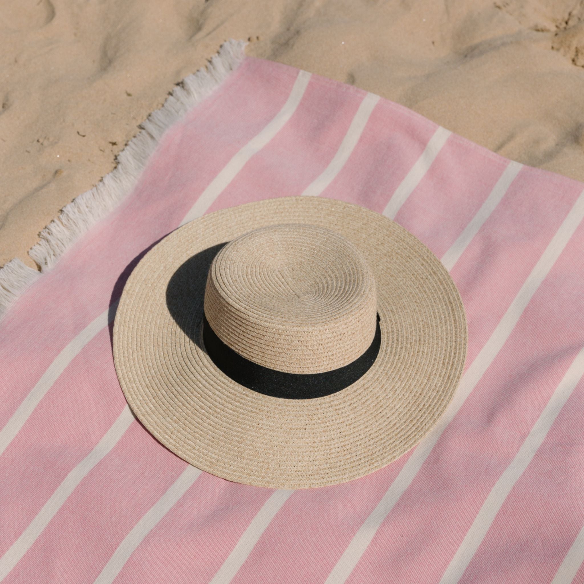 torres-novas-beach-belem-horizontal-stripes-towel-pink-lifestyle-1.jpg
