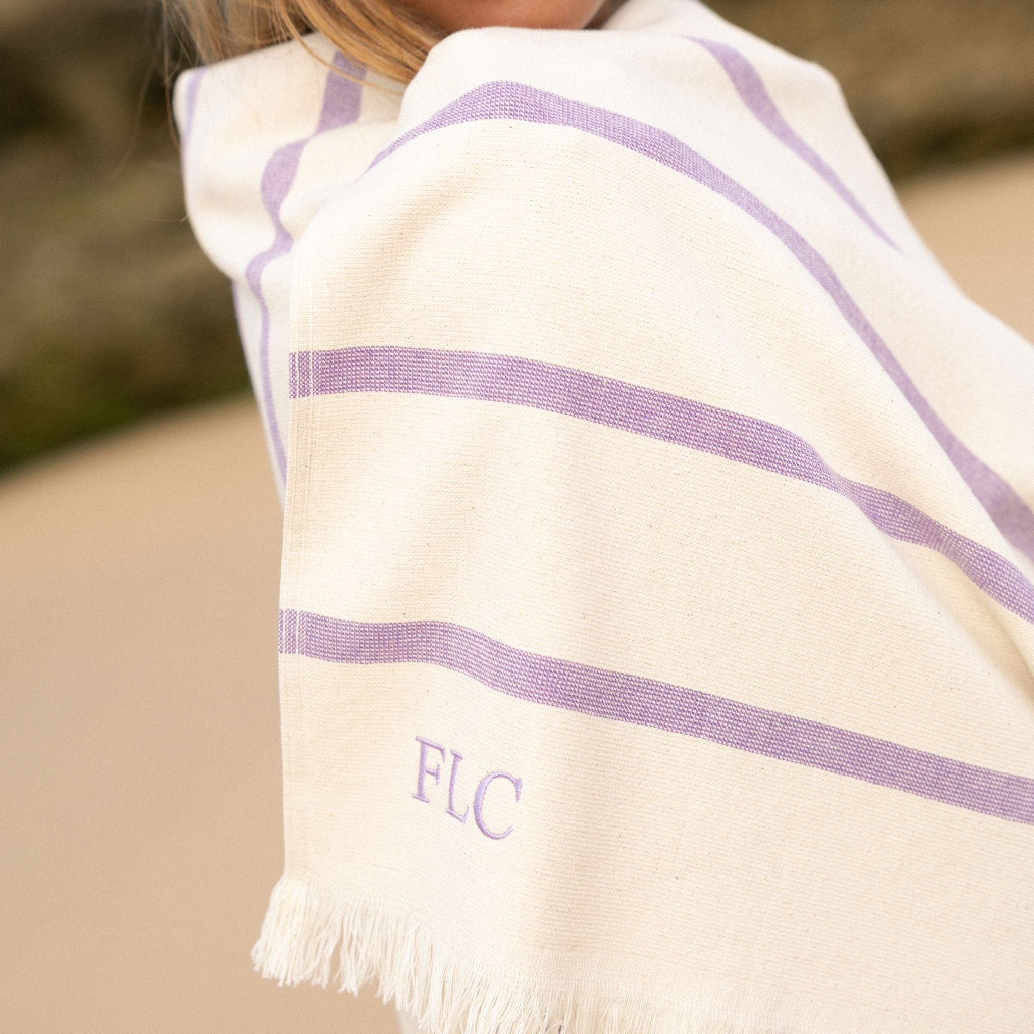 torres-novas-beach-boa-nova-horizontal-stripes-towel-lavender-lifestyle-4.jpg