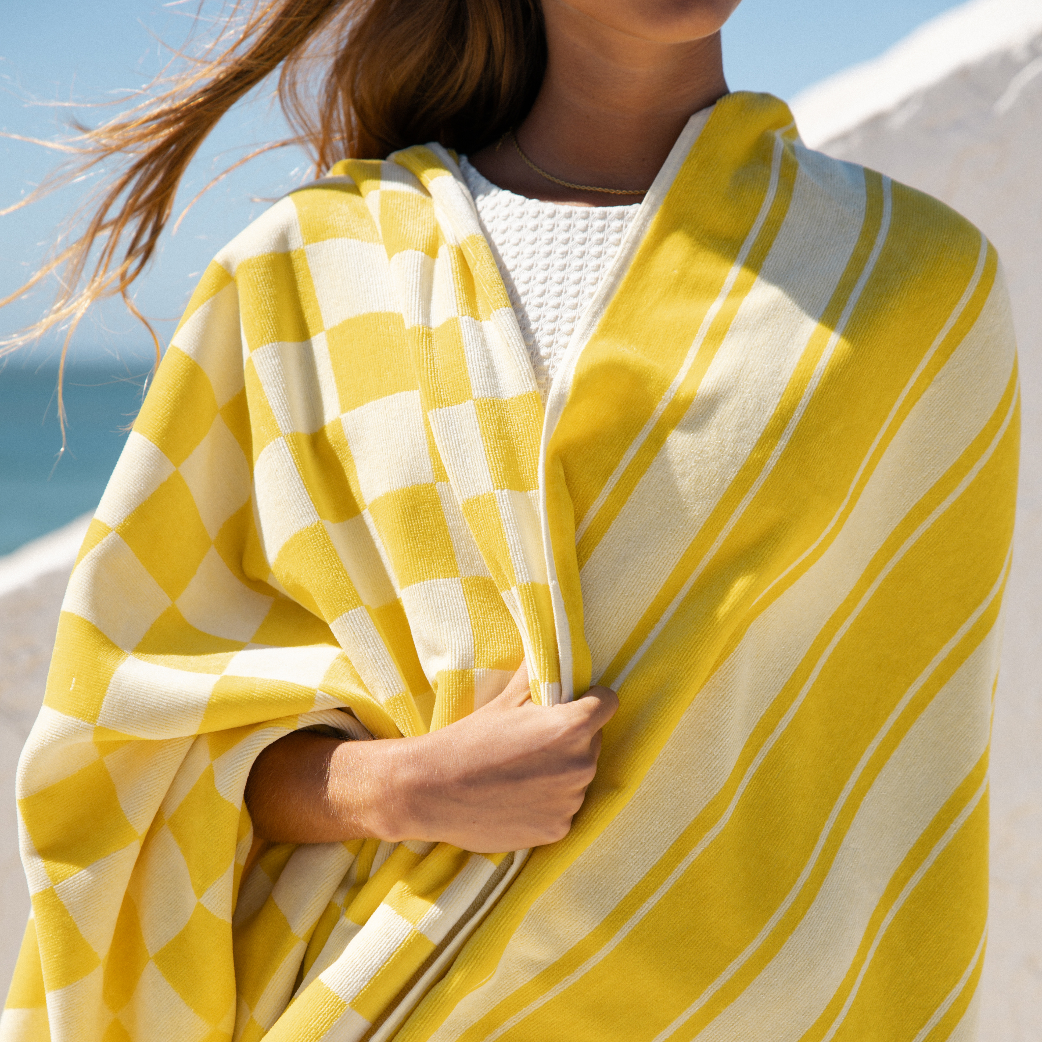 torres-novas-beach-meco-vertical-stripes-towel-yellow-lifestyle-5.png