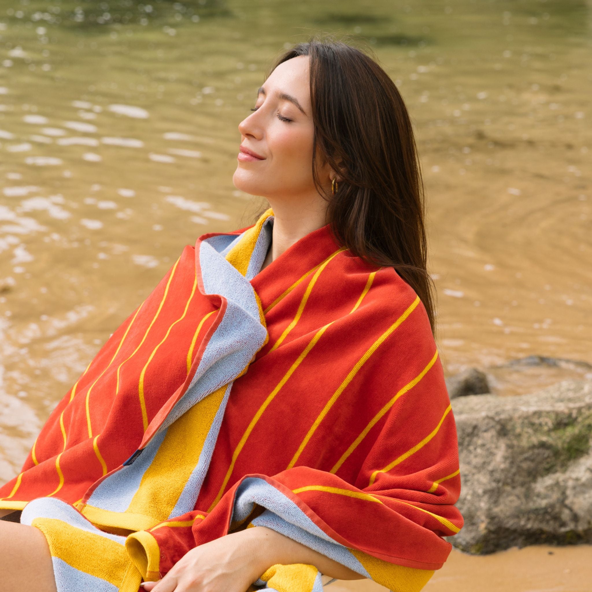 torres-novas-beach-pena-vertical-stripes-towel-yellow-lifestyle-5.jpg