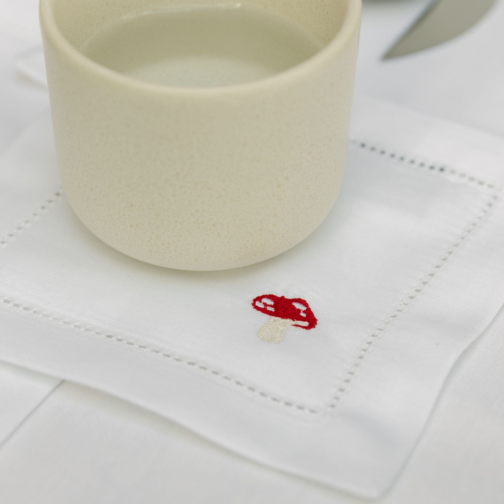 torres-novas-table-mafra-cotton-embroidery-fall-cocktail-napkin-mushroom-lifestyle-4.jpg