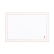 Mantelería Nazaré blanca, en algodón, con pequeños motivos de Navidad bordados.