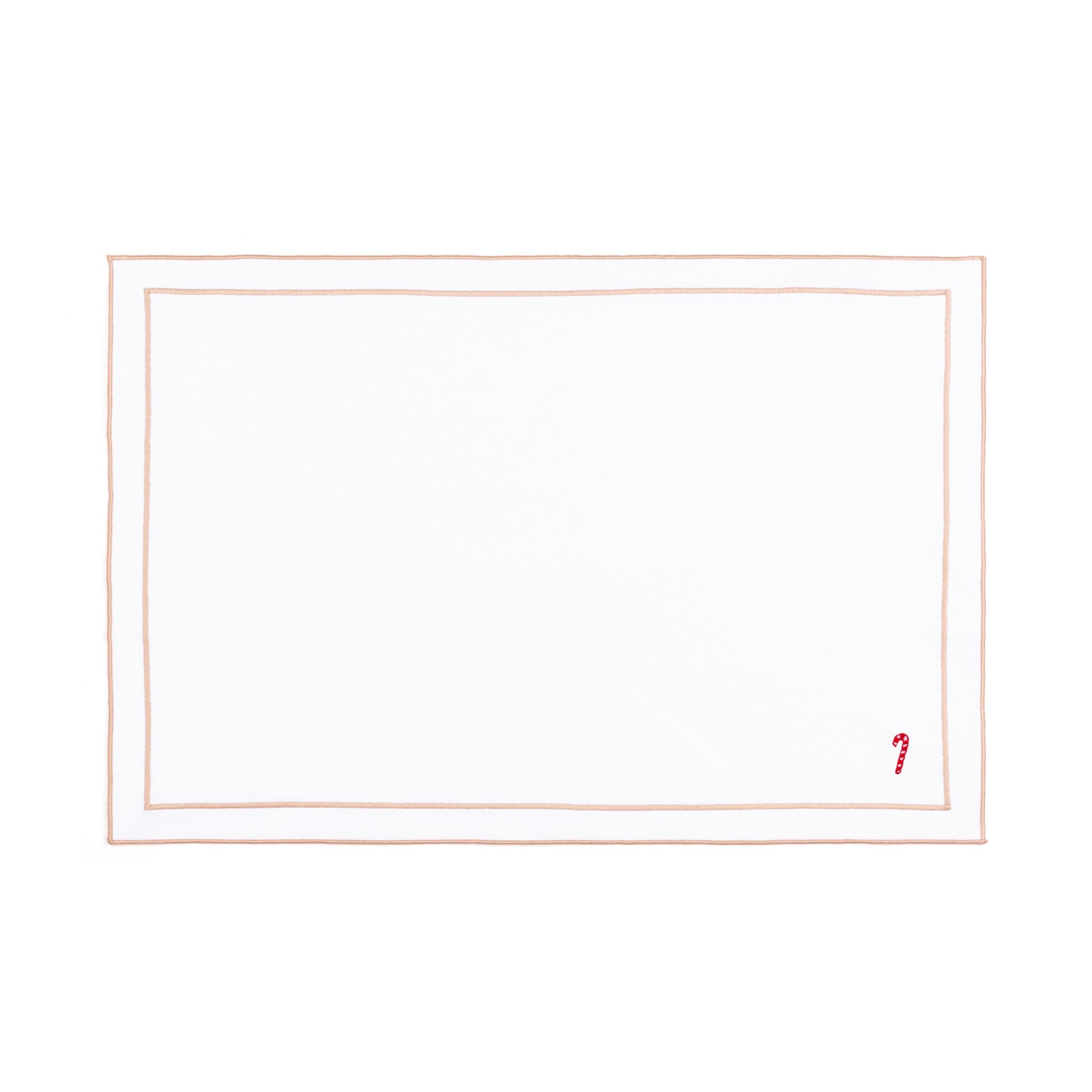 Mantelería Nazaré blanca, en algodón, con pequeños motivos de Navidad bordados.