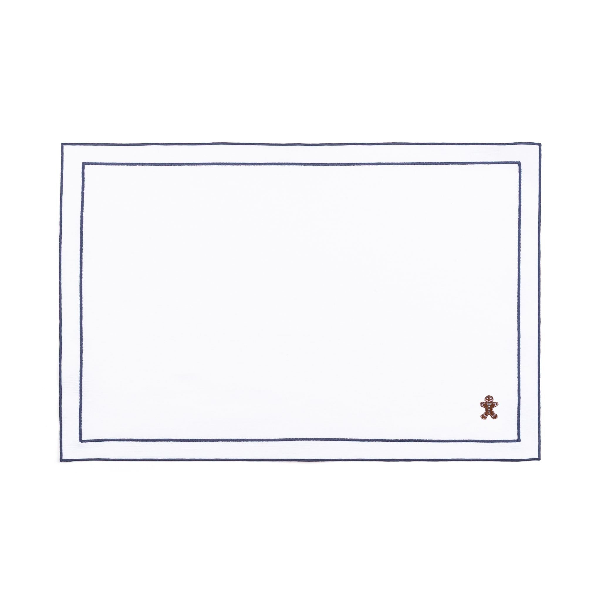 Mantelería Nazaré blanca, en algodón, con pequeños motivos de Navidad bordados.