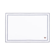 Mantelería Nazaré blanca, en algodón, con pequeños motivos de Navidad bordados.