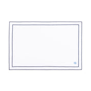 Mantelería Nazaré blanca, en algodón, con pequeños motivos de Navidad bordados.