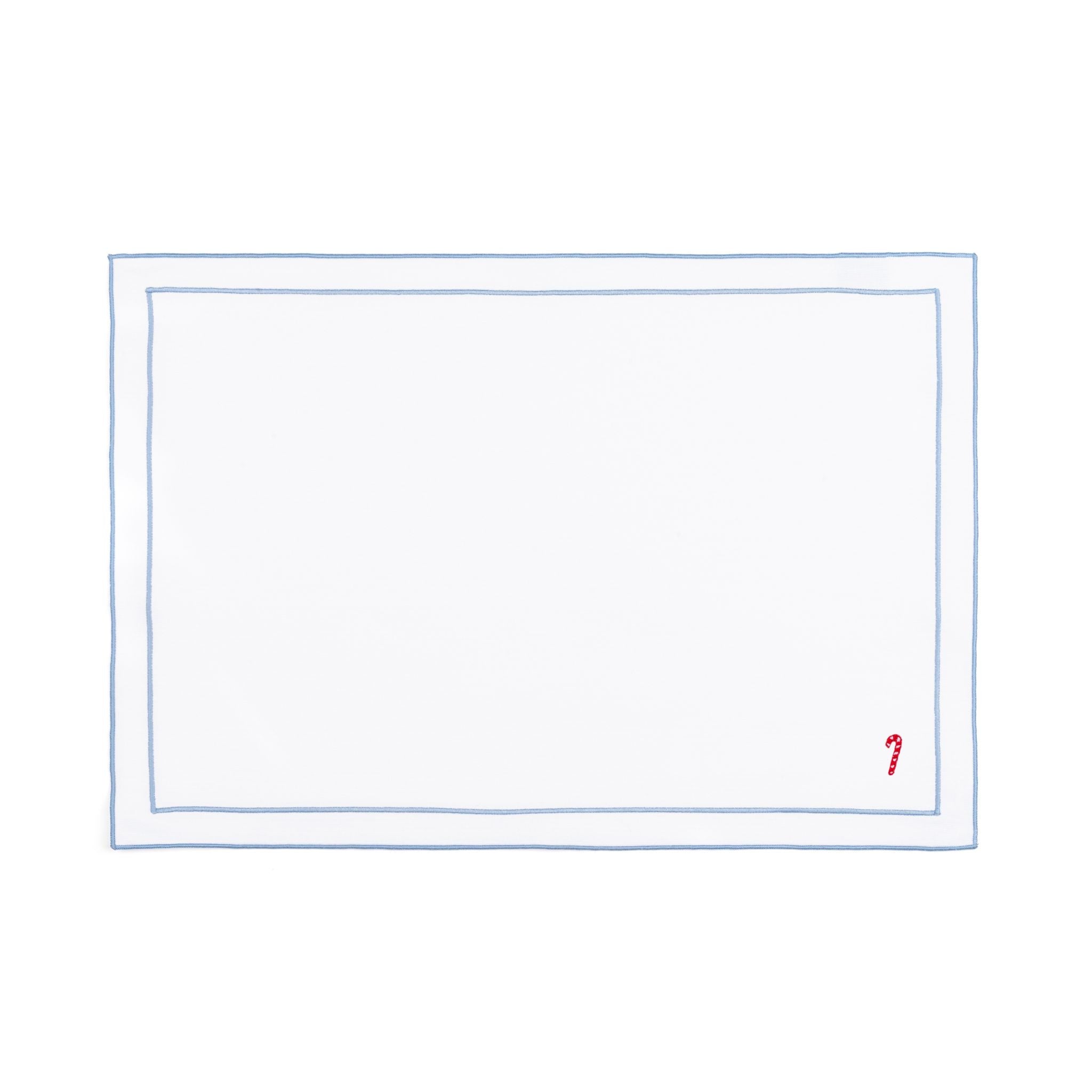 Mantelería Nazaré blanca, en algodón, con pequeños motivos de Navidad bordados.