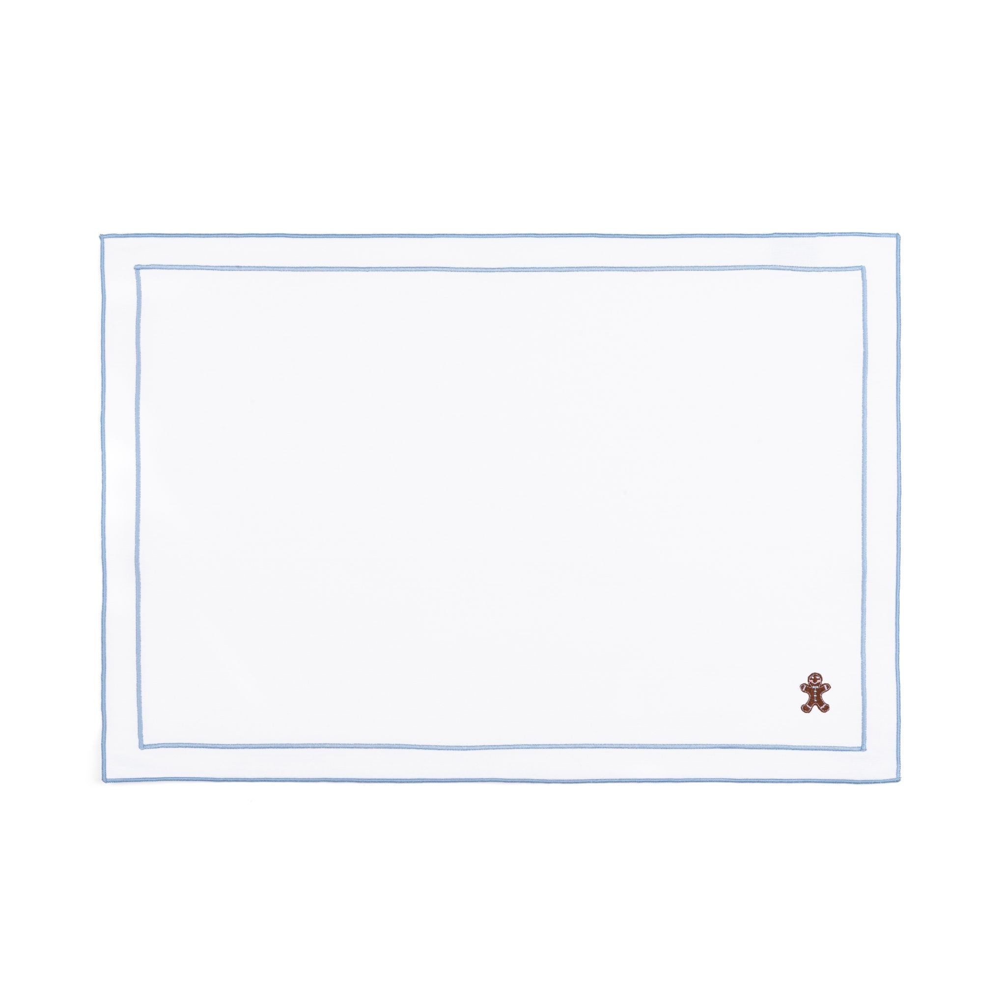 Mantelería Nazaré blanca, en algodón, con pequeños motivos de Navidad bordados.