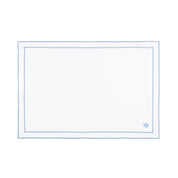 Mantelería Nazaré blanca, en algodón, con pequeños motivos de Navidad bordados.