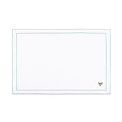 Mantelería Nazaré blanca, en algodón, con pequeños motivos de Navidad bordados.