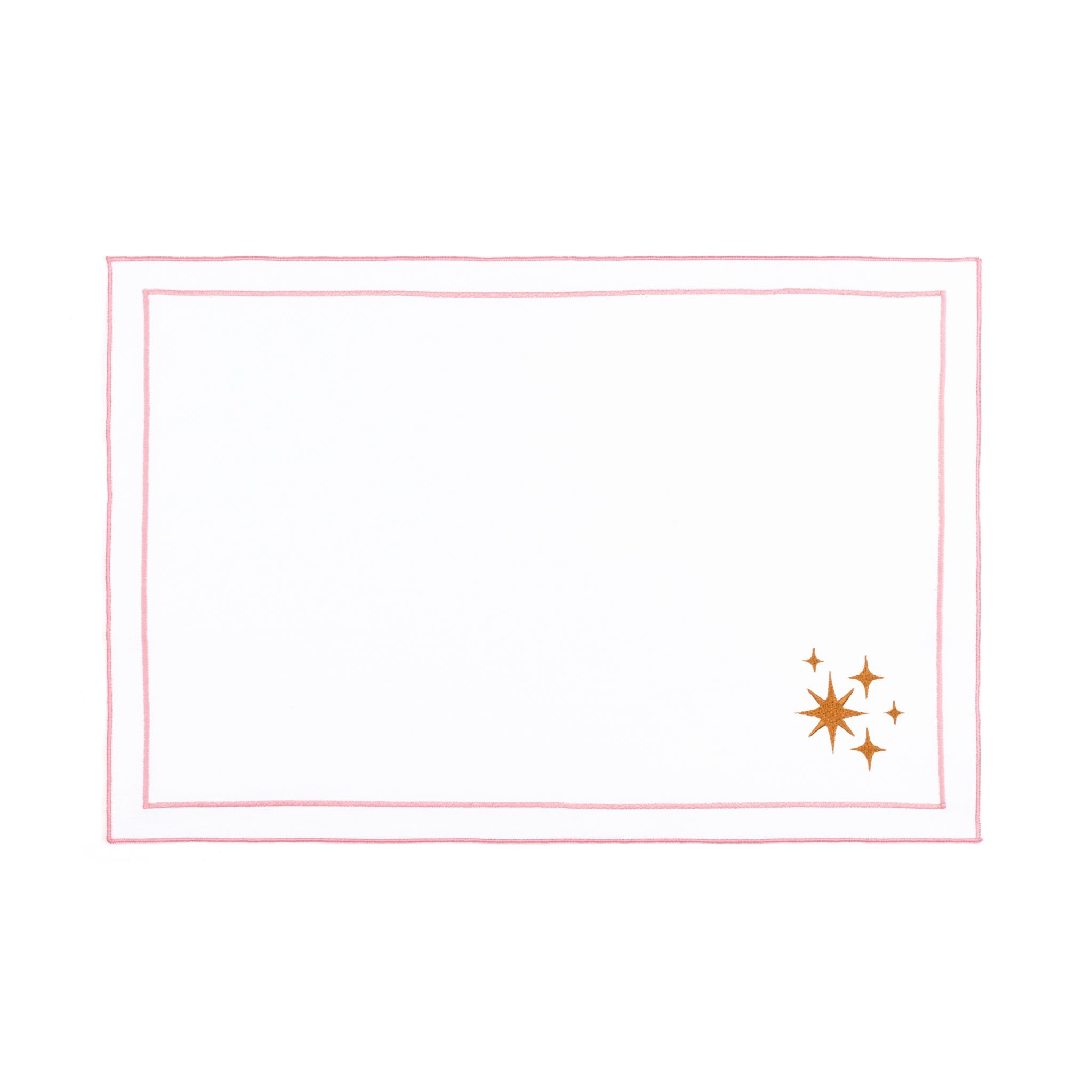 Mantelería Nazaré blanca, en algodón, con pequeños motivos de Navidad bordados.