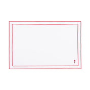 Mantelería Nazaré blanca, en algodón, con pequeños motivos de Navidad bordados.