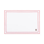 Mantelería Nazaré blanca, en algodón, con pequeños motivos de Navidad bordados.