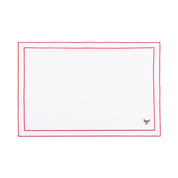 Mantelería Nazaré blanca, en algodón, con pequeños motivos de Navidad bordados.