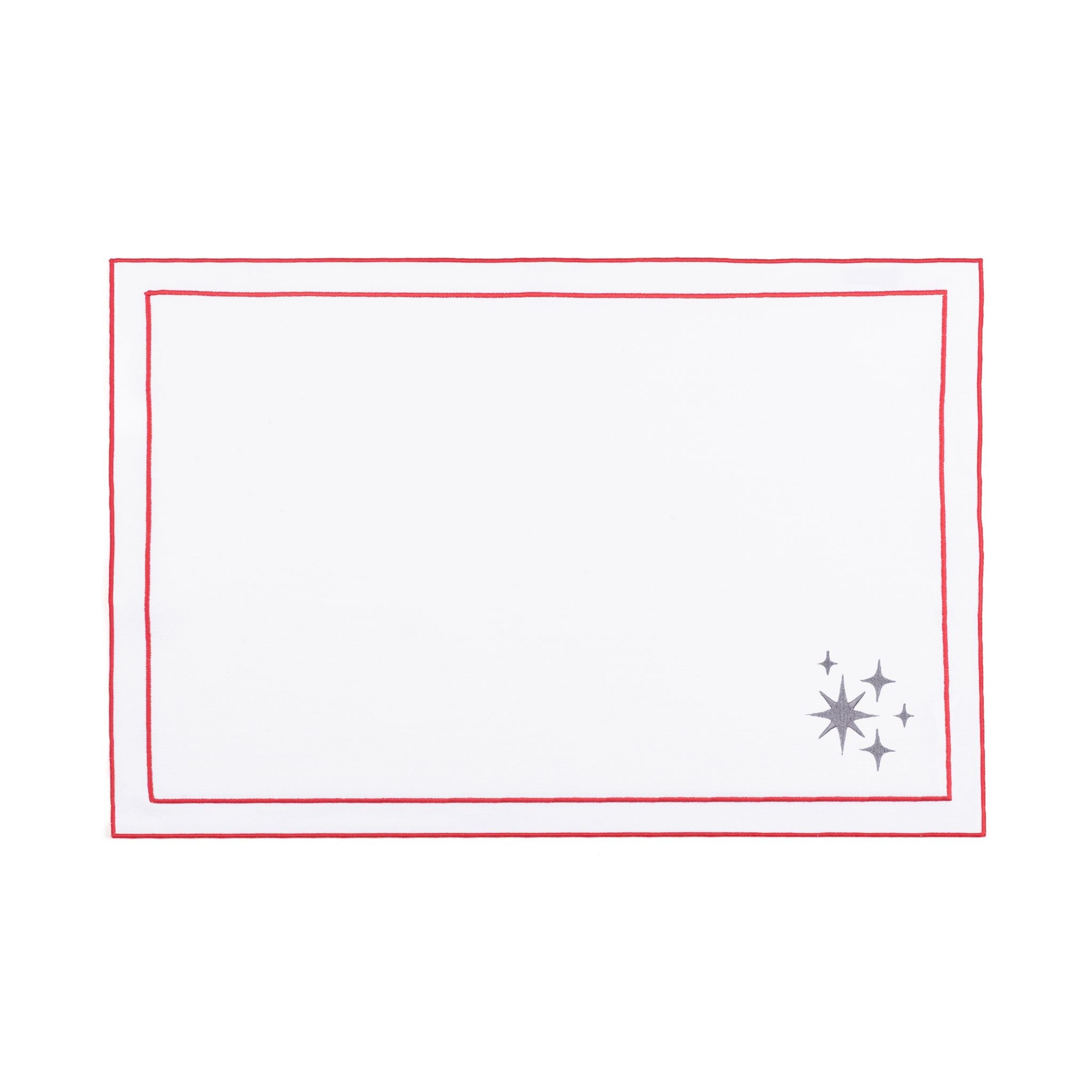 Mantelería Nazaré blanca, en algodón, con pequeños motivos de Navidad bordados.