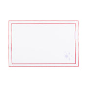 Mantelería Nazaré blanca, en algodón, con pequeños motivos de Navidad bordados.