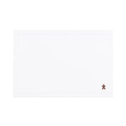 Mantelería Nazaré blanca, en algodón, con pequeños motivos de Navidad bordados.