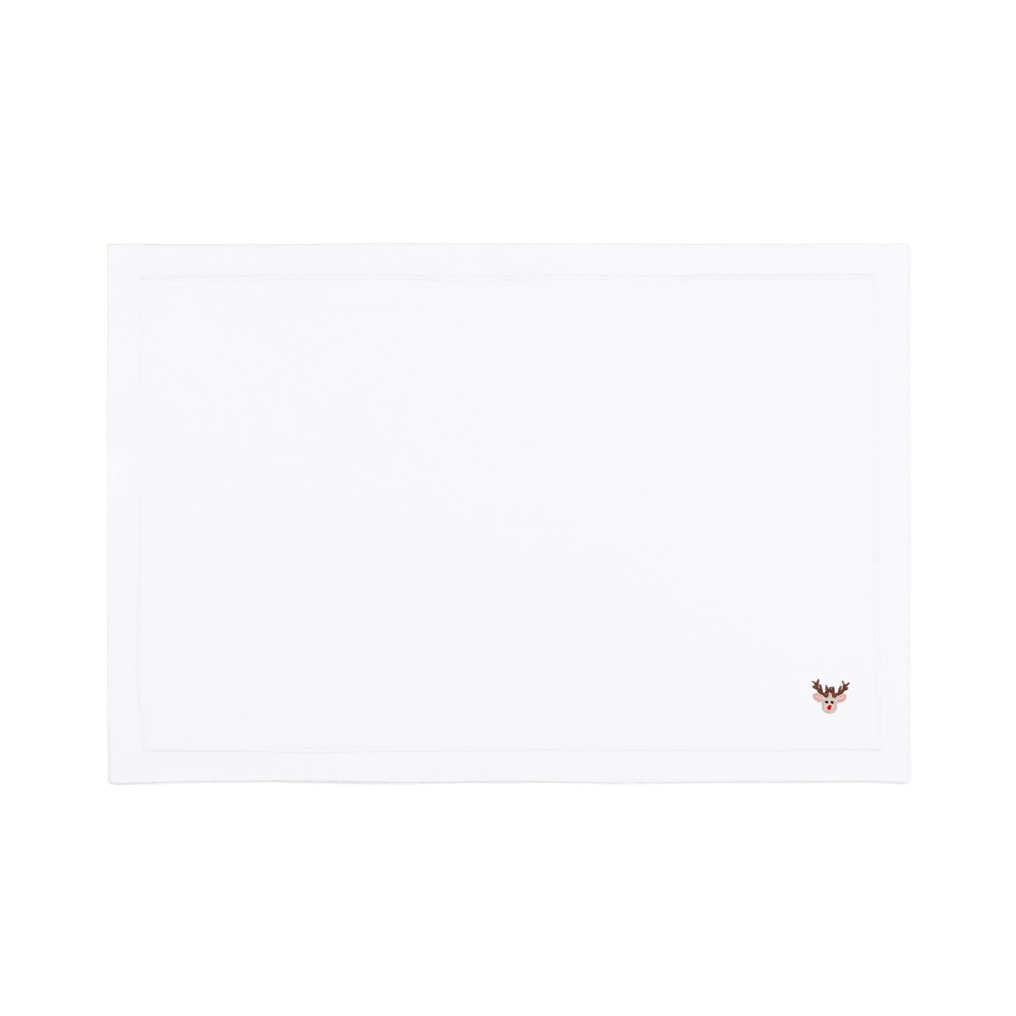 Mantelería Nazaré blanca, en algodón, con pequeños motivos de Navidad bordados.